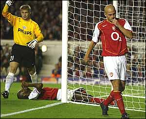 Partick Vieira (centre) is disappointed as another chance goes begging