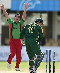 Ragheb Aga takes his second wicket for Kenya