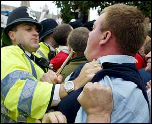 Policeman and protester