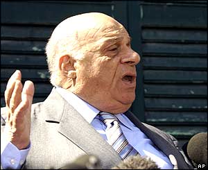 Veteran Turkish Cypriot leader Rauf Denktash speaks to the media after casting his vote