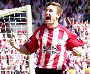 Marian Pahars celebrates his goal against Everton