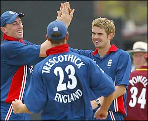 England players congratulate James Anderson (right) after he dismissed Chris Gayle