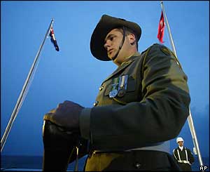 An Australian soldier stands guard during the Dawn Service at Anzac Cove in Gallipoli, western Turkey, early on Sunday
