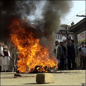 Tyres were set alight during protests in Srinagar
