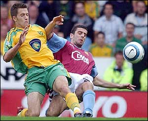 Adam Drury tackles Mark Delaney 