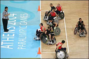 Great Britain's Rob Tarr scores against Belgium in the wheelchair rugby 