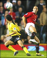 Liverpool's Luis Garcia and Rio Ferdinand 