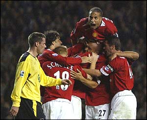 Man Utd celebrate Mikael Silvestre's winner 