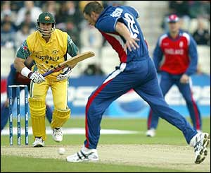 Matthew Hayden drives a delivery back past England's Steve Harmison
