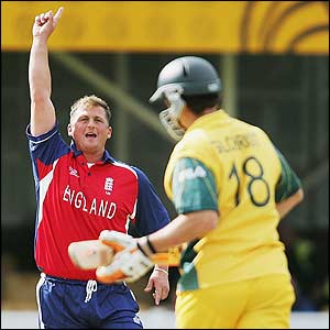 Darren Gough celebrates taking the wicket of Gilchrist