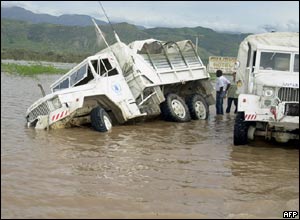 A World Food Programme truck nearly overturns delivering supplies in Haiti