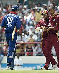 Michael Vaughan is caught behind for 25 off Ian Bradshaw