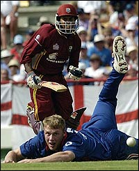 Andrew Flintoff fails to stop a shot by Chanderpaul