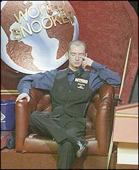 Graeme Dott sits in his chair