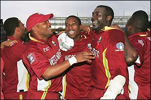 Captain Brian Lara hugs a delirious West Indies side