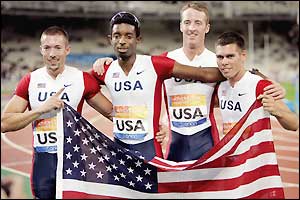 The USA's Paralympic 4x100m relay team celebrates gold