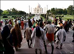 Indians and tourists visit the Taj Mahal on 26 September