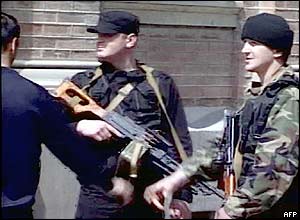 Armed local militias guard the office of Mr Abashidze in Batumi
