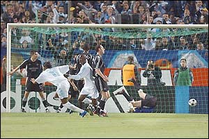 Marseille's Didier Drogba wheels away after scoring his second goal 