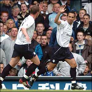 Djorkaeff celebrates his double