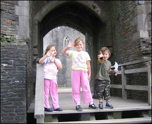 Andrew Williams' children Georgia, Grace and Lloyd, from Abergavenny, at Caerphilly Castle
