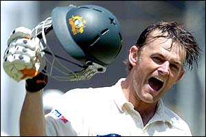 Gilchrist celebrates his century