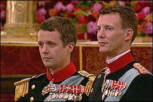 Danish Crown Prince Frederik stands with his brother Prince Joachim his best man