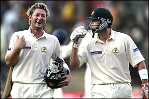 Clarke (left) shares a joke with Martyn as they leave the field