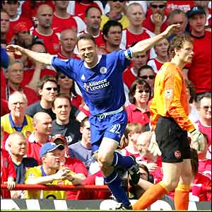 Paul Dickov celebrates his opening goal at Highbury