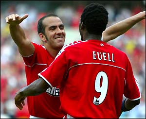 Jason Euell opens the scoring and takes the congratulations of Paolo di Canio