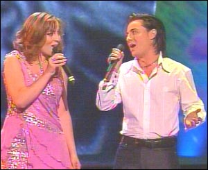 Julie and Ledwig gave the first duet of the evening, singing the English-language On Again... Off Again.