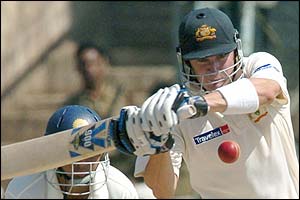 Australia's Michael Clarke plays a pull stroke to the boundary