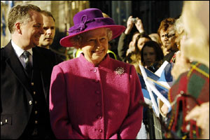 Meeting the people - the Queen and the first minister go on a short walkabout in bright sunshine