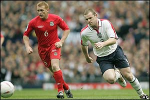 Wayne Rooney makes a typical surging run