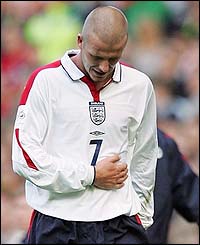Beckham leaves the field with an injury