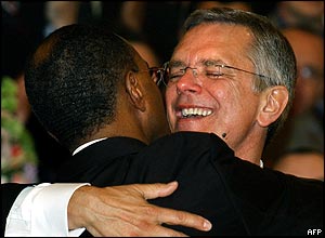 David Wilson (L) and Robert Compton (R) embrace after being married by a Unitarian minister