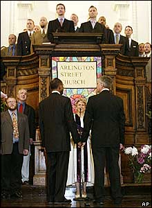 Unitarian Rev Kim Crawford Harvie announces she is able to legally marry David Wilson and Robert Compton in Arlington Street Church, Massachussets.