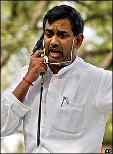 One supporter, apparently distraught at the news, held a gun to his head...