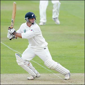 Mark Richardson carries his bat safely through the first two hours of play