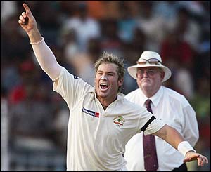 Shane Warne claims the wicket of Yuvraj Singh