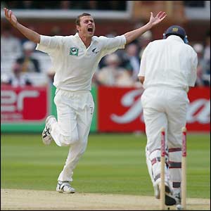 Chris Martin celebrates bowling Nasser Hussain