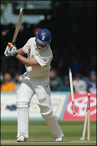 Simon Jones is bowled by Chris Martin