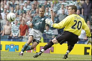 Henrik Larsson scores his 241st goal for the Glasgow giants 