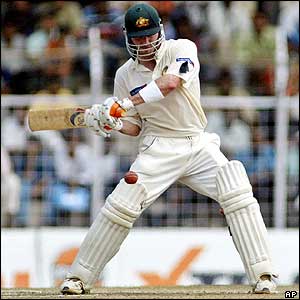 Damien Martyn cuts the ball to the boundary