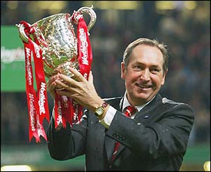 Gerard Houllier holds the Carling Cup aloft after Liverpool beat Manchester United in the 2003 final