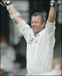 New Zealand opener Mark Richardson celebrates making a ton off just under 300 balls
