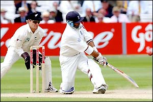 Nasser Hussain plays a sweep shot