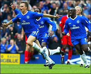 Jesper Gronkjaer celebrates his goal against Liverpool that earns Chelsea Champions League football