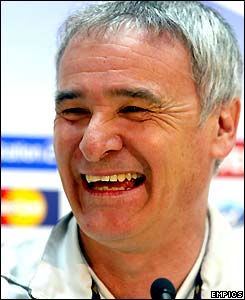 Claudio Ranieri laughs at a media conference