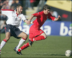 John Oster takes on Norway's Thorstein Helstad 